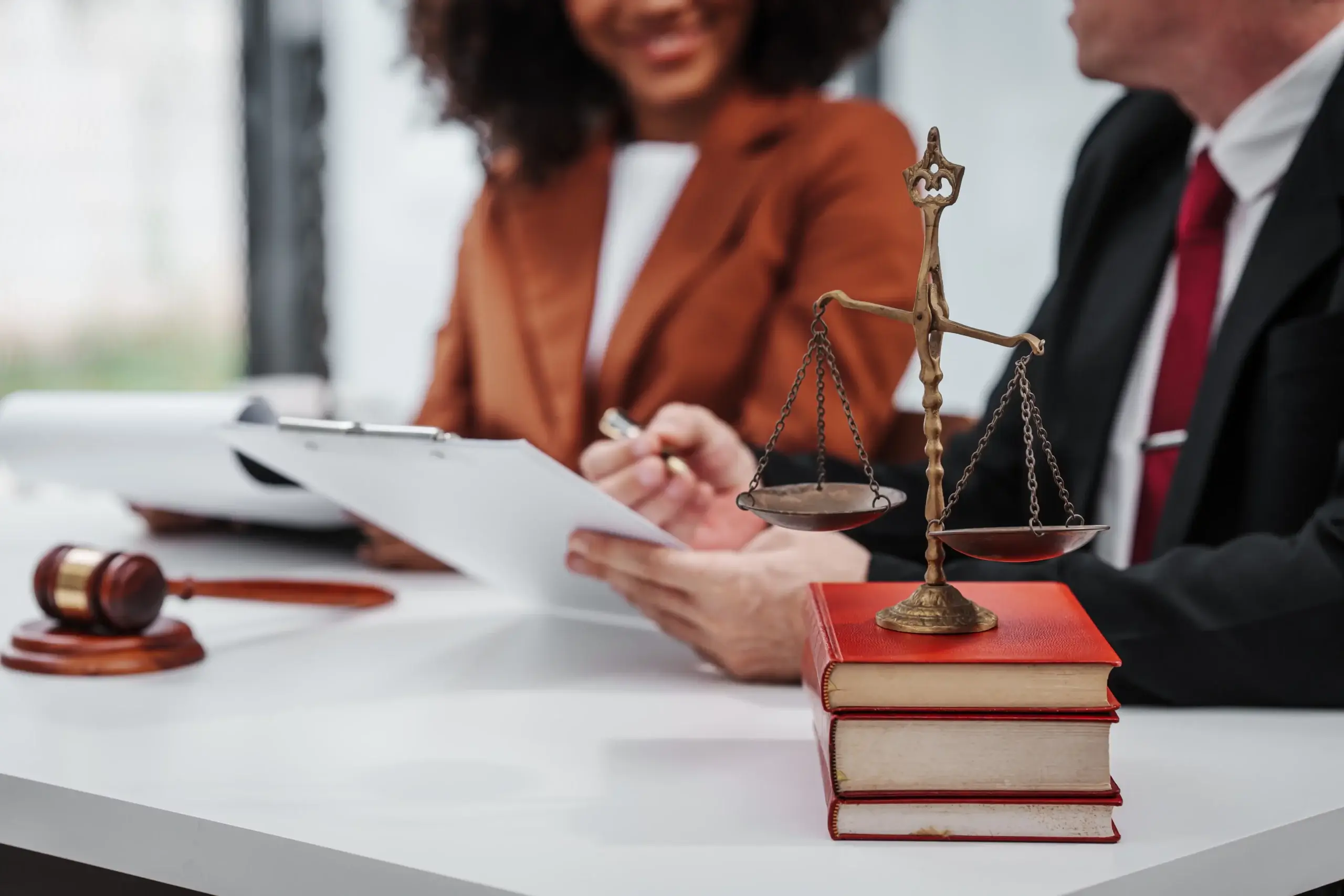 personal injury lawyer and client preparing for deposition